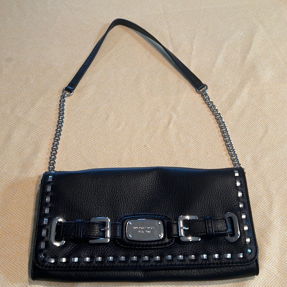 Black Michael kohrs clutch bag